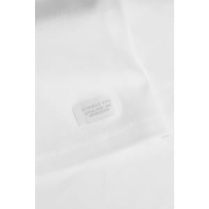 A white men's T-shirt with a brand tag featuring a logo. The fabric appears soft and smooth.