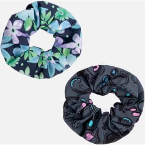 A duo set of printed scrunchies in floral and abstract designs, featuring shades of blue, green, and pink.