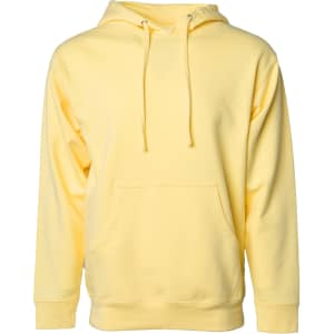 A midweight pullover hood in a soft yellow colour with a front pocket and drawstring hood. It has a logo.