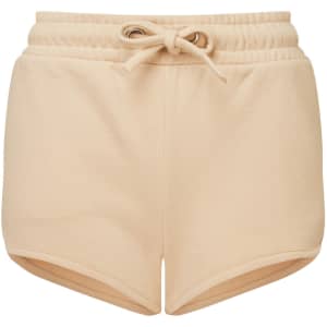 A pair of light beige recycled jogger shorts with an elastic waistband and drawstring adjuster.