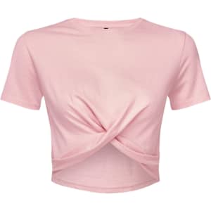 A pink twist crop top featuring a knot detail at the front, short sleeves, and a relaxed fit.