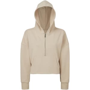 A beige 1/2 zip hoodie featuring a front pocket and a hood, with a simple branding logo.
