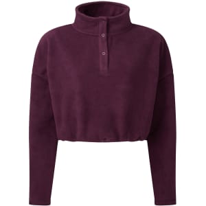 A cropped fleece top in a deep purple shade, featuring a high collar and three-button placket. It has a relaxed fit.