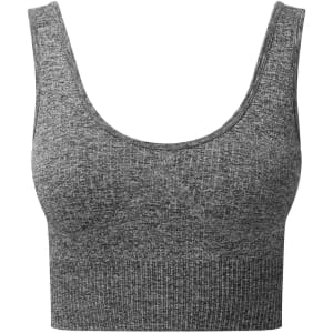 A grey ribbed seamless sport bra featuring a cropped design and wide straps. The product has a logo on it.