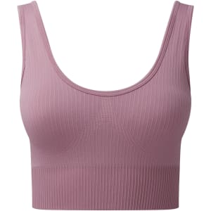A ribbed seamless sport bra in a soft mauve colour, featuring a scoop neckline and broad straps.