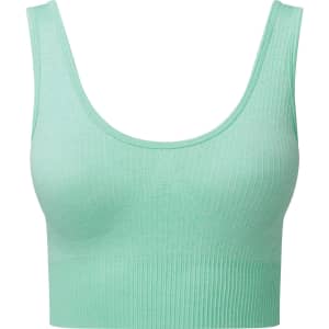 A mint green ribbed seamless sport bra with a fitted design and wide straps. It features a logo on the band.