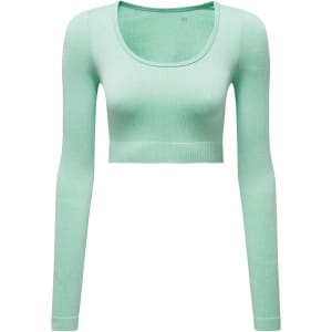A ribbed, seamless crop top in a light mint green colour, featuring long sleeves and a scoop neckline.