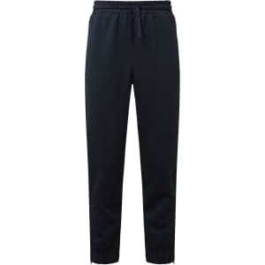 Navy Spun Dyed Joggers with an elastic waistband and tapered cuffs. Features a logo on one side.