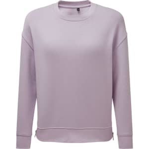 A lilac sweatshirt with a relaxed fit, featuring a simple design and a small logo.