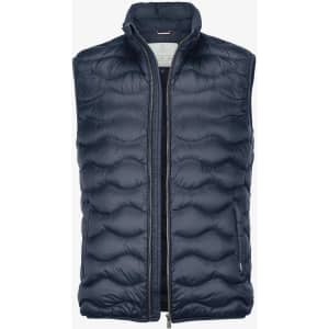 A dark navy puffer vest with a high collar and zip front, featuring a logo on the chest.