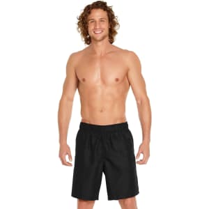 Men's black volley swim trunks featuring a waistband and a logo. Designed for swim and sun protection with UPF 50+.