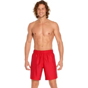 Red men's volley swim trunks featuring a comfortable elastic waistband and a logo. Ideal for beach or pool wear.