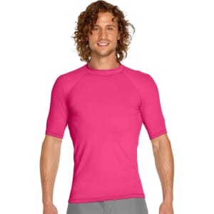 A vibrant pink adult short sleeve rashie with a fitted design, featuring a logo on the front.