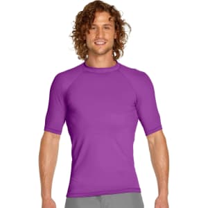 A purple adult short sleeve rashie featuring a fitted design and a logo on the chest.