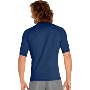 A short sleeve rashie in navy blue, featuring a fitted design and a logo on the back.