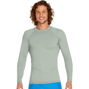 A long sleeve rashie in light grey, featuring a fitted design and a logo on the chest.
