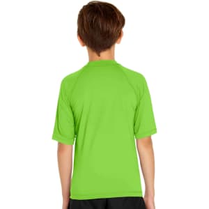 A bright green youth short sleeve rashie with a smooth finish, featuring a logo on the back.