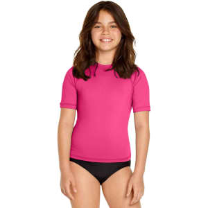 A pink short sleeve rashie for youth, featuring a relaxed fit and a logo on the front.