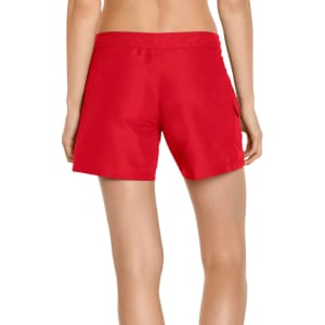 Red women's cargo board shorts with a fitted waist and side pockets, featuring a logo.