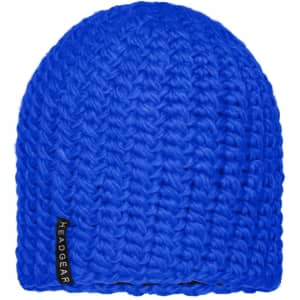 A bright blue crocheted cap featuring a textured design and a small logo tag.