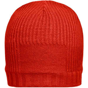 A red beanie featuring a ribbed texture and a logo patch on the side.
