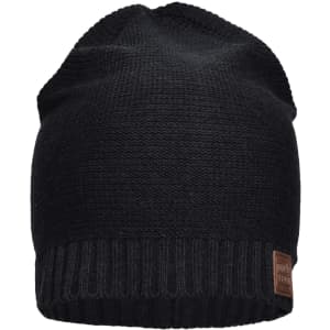 A black cotton hat with a ribbed brim and a woven label on the side.