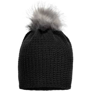 A fine crocheted beanie in black, featuring a fluffy grey pom-pom on top. The design is textured and stylish.
