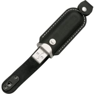 A black leather flash drive with a metal connector, featuring a snap closure and a logo on the leather.