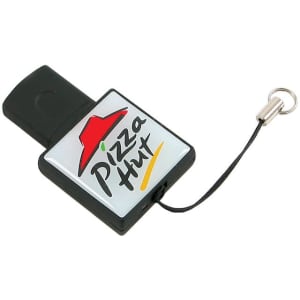 A black promotional flash drive with a square shape and a logo featuring a red hat and text.