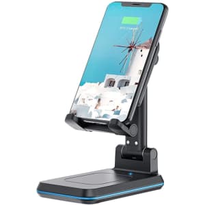 A foldable wireless charging stand in black and blue, holding a smartphone in an upright position.