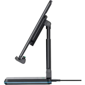 A foldable black wireless charging stand with adjustable height suitable for phones and tablets.