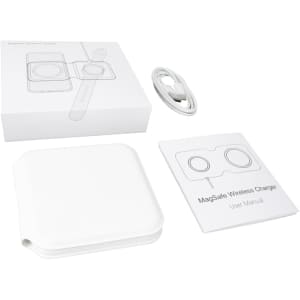 A white magnetic wireless charger with a charging cable and user manual, presented in a simple box.