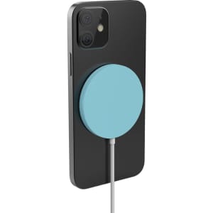 A black smartphone with a teal circular magnetic wireless charger attached, featuring a charging cable.