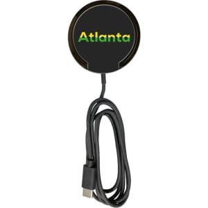 A black magnetic wireless charging stand with a USB cable, featuring a logo on the charging surface.
