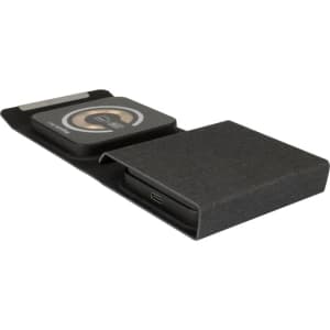 A sleek black wireless charger featuring a magnetic design, with a textured surface and a USB-C port.