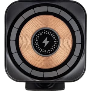 A black magnetic wireless car charger with a copper centre and a circular design, featuring a logo.