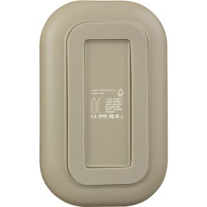 A light brown wireless charger with a rectangular shape and a branding logo on the surface.