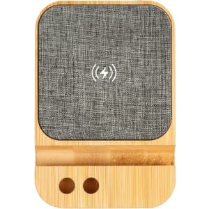 A wireless charger featuring a bamboo base and grey fabric surface, designed for eco-friendly charging.