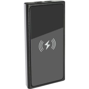 A sleek black wireless power bank with a smooth surface and a logo, featuring two USB ports.