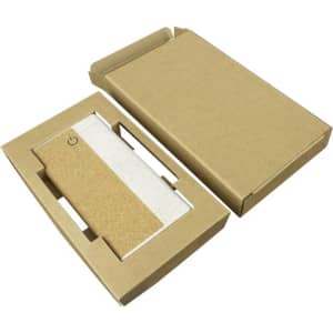 A wireless eco power bank in a beige cardboard box, featuring a simple design and an on/off button.