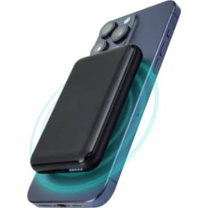 A black MagSafe power bank magnetically attached to a smartphone, showcasing its sleek design.