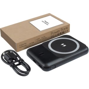 A black Jordan 15W MagSafe Power Bank with a 5000 mAh capacity, alongside a USB charging cable and a brown box.