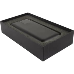 A black power bank in a sleek black box with a foam insert, featuring a logo on the device.