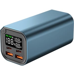 A blue power bank with USB ports and a digital display showing voltage and charge details.