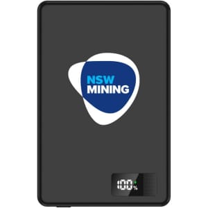 A black power bank with a logo and a digital display indicating battery percentage.