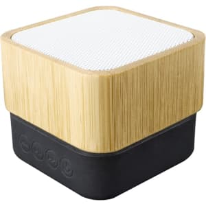 A square wireless speaker with a bamboo exterior and a black base, featuring a mesh speaker grille on top.
