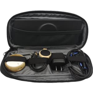 A black eco accessory pouch containing various cables, a plug, and a round device secured with straps.