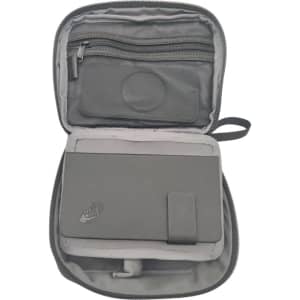 A grey accessory pouch opened, revealing a zippered pocket and a compartment for items. It includes a logo.
