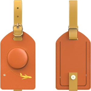 An orange luggage tag with a circular feature and a yellow strap, offering a stylish travel accessory.