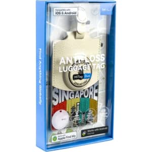 A white luggage tag featuring a cityscape design, packaged in a blue box with a logo. Includes a small red device.